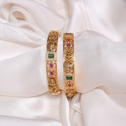 Peacock & Lakshmi Motifs Engraved Silver Bangles with Multi-Colour Stones