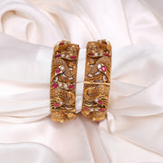 Antique Finish Peacock Silver Bangles with Kundan Highlights