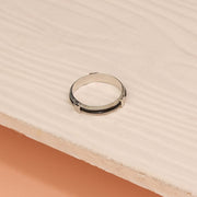 Sleek Silver Ring with Black Enamel Highlight
