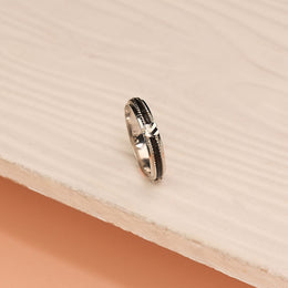 Sleek Silver Ring with Black Enamel Highlight