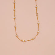 Timeless Gold-Finish Chain Adorned with Pearl Beads