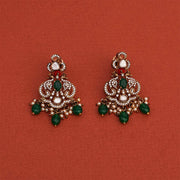 Striking Silver and Kundan Earrings with Green Bead Hangings