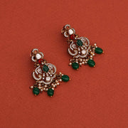 Striking Silver and Kundan Earrings with Green Bead Hangings