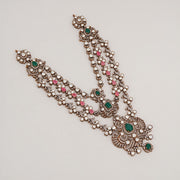 Silver Stepped Haaram with Kundans, Green, and Pink Stones