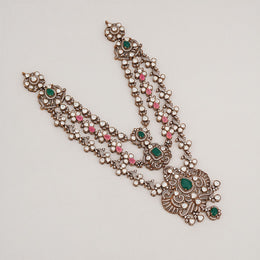 Silver Stepped Haaram with Kundans, Green, and Pink Stones