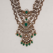 Silver Stepped Haaram with Kundans, Green, and Pink Stones