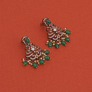 Silver and Kundan Earrings with Peacocks and Green Stones