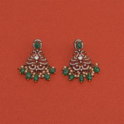 Silver and Kundan Earrings with Peacocks and Green Stones