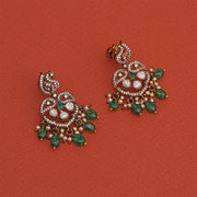 Elegant Silver Peacock and Kundan Earrings with Green Stone Beads