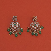 Elegant Silver Peacock and Kundan Earrings with Green Stone Beads
