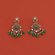 Floral Silver and Kundan Earrings with Peacock Detailing