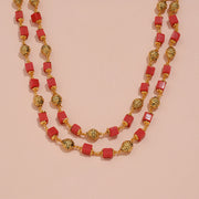 Traditional Gold-Tone Temple Mala with Vibrant Pink Bead Accents
