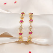 Elegant Silver Floral CZ Bangles with Red Stone Highlights