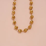 Traditional Gold Floral Bead Mala with Green Accent Details