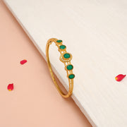 Opulent Silver Kada in Gold Finish with Emeralds