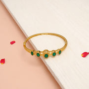 Opulent Silver Kada in Gold Finish with Emeralds
