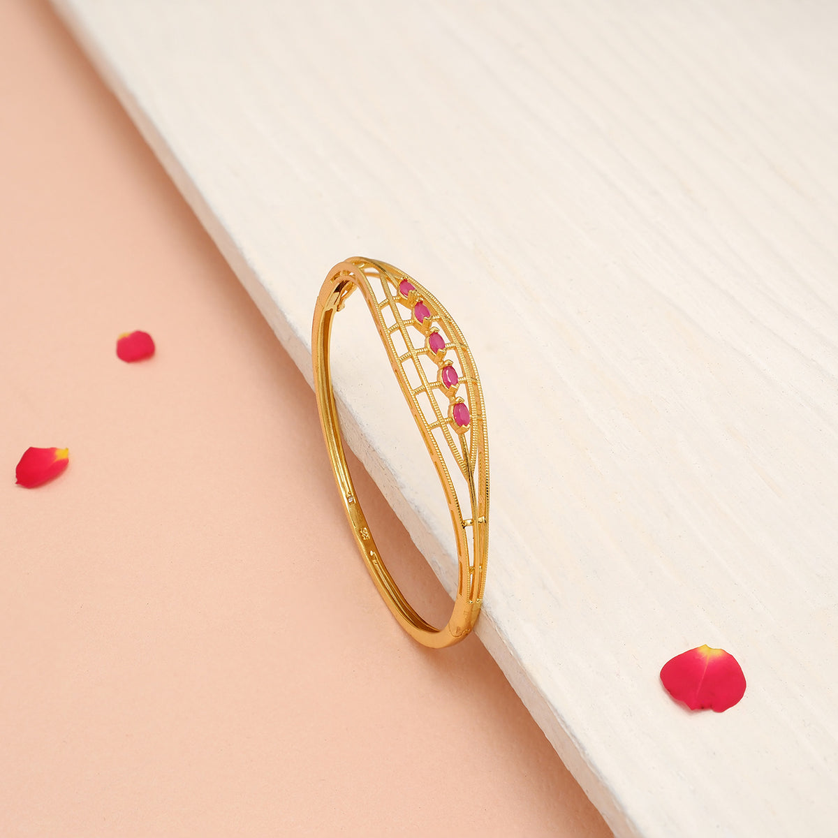 Elegant Silver Kada in Gold Finish with Red Stones – Padmam