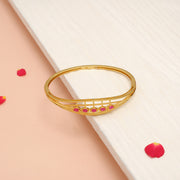 Elegant Silver Kada in Gold Finish with Red Stones
