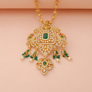 Elegant Emerald Crystal Statement Pendant with Pearl Bead Tassels