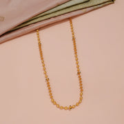 Traditional Gold Beaded Mala with Black Bead Accent Details