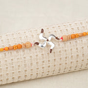 Silver Swastik Shape Rakhi