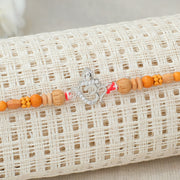 Silver Omkara with Feather Rakhi